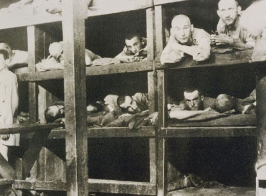 Who slept on the floor under the bunks in Stalin's camps